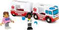 Introducing the Brio World Rescue Ambulance by Brio: A toy set featuring a Rescue Ambulance adorned with a striking red and white checkerboard design, complete with functional sirens. The set includes two toy figures—one dressed in a doctor's coat with a stethoscope and the other in a pink and white striped shirt.