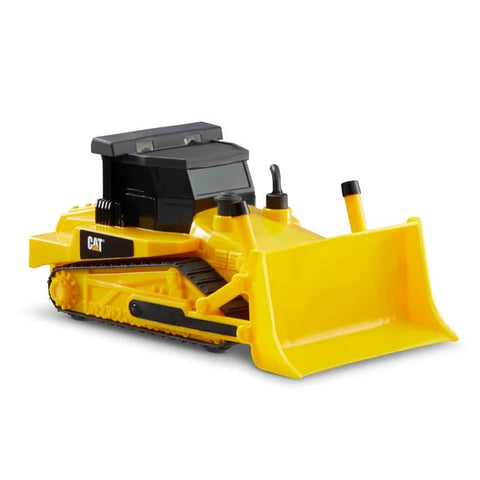 The CAT Power Mini Crew - Bulldozer by CAT is a yellow toy bulldozer with black accents and a black cab. It boasts detailed caterpillar treads, a front blade for pushing, realistic lights and sounds, as well as exhaust pipes. The design also features a branding label on the side with the text "CAT.