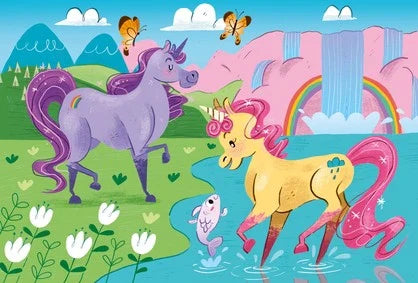 A whimsical scene featuring a purple unicorn and a yellow unicorn with pink hair near a pond. Butterflies flutter above, a rainbow arcs in the background, and waterfalls cascade down cliffs in bright and vibrant colors. A fish leaps joyfully from the water near the unicorns, reminiscent of Clementoni 2 x 20 Piece Unicorn Puzzles — perfect for children.