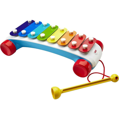 The Fisher-Price Classic Xylophone is a vibrant pull-along musical toy featuring eight rainbow-colored bars, each topped with a white button. This delightful xylophone rests on a blue and white frame with red circular ends and includes a yellow mallet that's attached by a red cord.