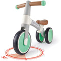 The HAPE My First Balance Bike - Green by HAPE is a small, colorful balance bike featuring a lightweight aluminum alloy design with a grey frame, green wheels, and brown handlebars and seat. The front wheel is displayed turned at a 30-degree angle with a red protractor graphic indicating the measurement.