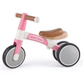 The HAPE My First Balance Bike Pink by HAPE is a pink and white adjustable balance bike designed for young children. It features a sturdy frame made from lightweight aluminium alloy, two large front wheels and two smaller rear wheels for added stability, and a brown, ergonomic seat. The handlebars and wheels are designed in a minimalist style.