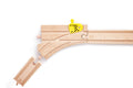 The Hape Adjustable Switch Track 2pc by HAPE, made of natural wood, is displayed with one piece slightly detached from the main track. A small yellow lever on the main track enables rail direction changes, making it an engaging wooden toy railway set for kids.