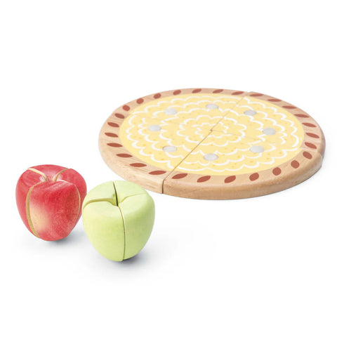 The Le Toy Van Apple Tart Wooden Playset by LE TOY VAN includes a toy pizza and two wooden toy apples. Crafted from sustainable rubberwood, the pizza features a yellow and cream patterned top with a red border and is cut into slices. The apples, one red and one green, are segmented into quarters to demonstrate cut sections. Safe non-toxic paints ensure a worry-free playtime experience.