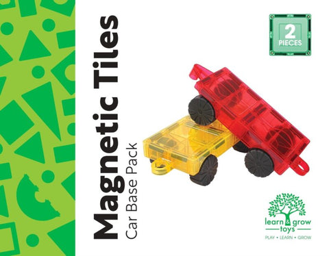 Image of a toy box labeled "Learn & Grow Rainbow Magnetic Tiles Car Base Pack 2pc" showing two magnetic, wheel-mounted tiles – one red and one yellow. The box indicates it's a set of two pieces designed for vehicle construction. The background features abstract green shapes, and the bottom right corner displays "Learn & Grow," enhancing STEM skills.
