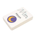 A stack of MIEREDU Wipe Clean Activity Set - Letters is displayed, with the top card showing the letter "M" in upper and lower case, the word "Moon," and an illustration of a crescent moon in yellow and blue. These letters from MIEREDU are perfect for building literacy skills through hands-on practice.