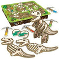 The Orchard Toys Dinosaur Dig Game by Orchard Toys is an educational toy set featuring pieces of dinosaur skeletons that can be assembled into standing figures, enhancing dexterity development. The background shows a prehistoric-themed playing board with excavation tools such as a pickaxe and test tubes, along with some dinosaur illustrations, making it a perfect 3D dinosaur game.