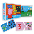 A boxed *Peppa Pig Learn to Count Puzzle by Holdson* features numbered puzzle pieces. The box displays Peppa Pig with images of puzzles numbered 1, 2, 3, and 4. Outside the box, brightly colored pieces show the numbers 8 and 3 with illustrations—perfect for kids to match numbers while having fun!