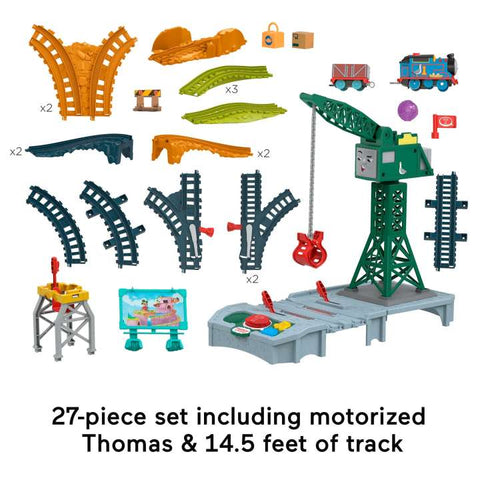 An image of the Fisher-Price Thomas & Friends Talking Cranky Delivery Train Set, a 27-piece toy featuring a motorized Thomas the Tank Engine and 14.5 feet of track. The set includes various track pieces, a crane, a cargo loader, and other accessories to create an exciting play scenario.