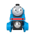 A delightful Thomas & Friends Wooden Railway Figure 8 Track Pack by Fisher-Price, features a toy train with a friendly face on the front. Predominantly blue with black and red accents, it has large blue wheels and appears to be made of plastic. Perfect for preschool kids, the smiling face and expressive eyes give this charming train an appeal reminiscent of the beloved Thomas & Friends series.