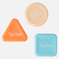 Three vibrantly colored sorting blocks, part of the Tiger Tribe Shape Shakers collection from TIGER TRIBE, are shown against a white background. These educational musical tools come in shapes of a circle (beige), a triangle (orange), and a square (blue), each bearing the "Tiger Tribe" logo.