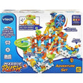 The image shows the VTech Marble Rush Adventure Set by Vtech, which includes 135 building pieces. The box displays a vibrant marble run toy featuring an electronic Ferris wheel, ramp challenge, basket challenge, and an integrated light and sound system. It is suitable for children ages 4 and up.