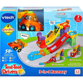 The Vtech Toot Toot Drivers 3 in 1 Raceway by Vtech is a colorful toy featuring a SmartPoint racer and multiple tracks. The box highlights interactive features such as lights, sounds, and phrases with various play modes for children aged 1-5. The set includes 2 SmartPoint locations.