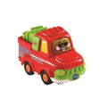 The Vtech Toot-Toot Drivers Pick-Up Truck is a vibrant and playful toy featuring a cheerful face with sunglasses and a mustache. This red truck is accented with green and yellow details, including green items in the back, making it visually appealing. Designed by Vtech, this interactive toy from the Toot-Toot Drivers learning zone guarantees both fun and education for children.