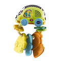 The Vtech Touch & Feel Sensory Keys by Vtech is a vibrant baby toy shaped like a car, featuring various buttons and patterns. Attached to a white loop, this rattle includes three textured, key-like attachments in different shapes and colors: yellow, blue, and orange. The brand name “VTech” is visible on the product.