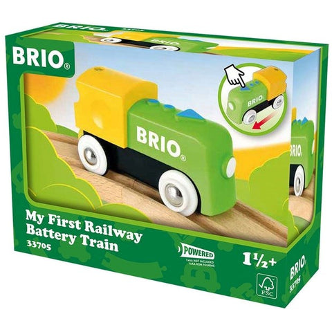 A green and yellow Brio My First Railway Battery Engine in a box labeled "My First Railway Battery Engine." The box displays an image of the assembled children's toy and notes that it is battery-powered. Suitable for ages 1½ and up, product number 33705.