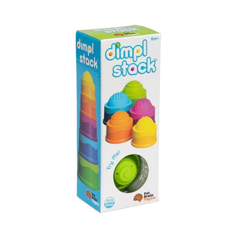 The image showcases the packaging of Fat Brain Toys Dimpl Stack, a product from Fat Brain Toys. The white box, adorned with colorful graphics of stackable, textured silicone bowls, highlights "BPA Free" and "Fine Motor Skills." A window preview reveals a green textured item inside. Designed for 6 months and older, it promises tactile fascination.