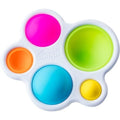 The Fat Brain Toys Dimpl by Fat Brain Toys is a sensory toy with five colorful silicone bubbles in pink, green, blue, orange, and yellow of varying sizes set in a white plastic frame. These bubbles can be pushed in and out to aid tactile development. The toy has the word "dimpl" embossed on it.