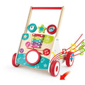 This image showcases the HAPE My First Musical Walker, an ideal choice for early walking. This vibrant wooden walker from HAPE features xylophone keys, rotating gears, and various brightly colored shapes attached to a sturdy wooden frame with red handles and wheels. Adorned with decorative musical notes and symbols, it’s an engaging toy designed to captivate toddlers.