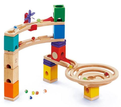 Introducing the HAPE Race to the Finish, a vibrant wooden marble run set from HAPE that includes an array of blocks, ramps, and a spiraling pathway. The marbles cascade through this beginner's set, which boasts 58 pieces supported by multicolored pillars with holes. Additionally, it features a charming windmill and other playful elements for added fun.