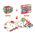 Image showing two toy sets. The top left includes a storage box with a wooden train set and tracks labeled HAPE Railway Bucket Builder Set (E3764). The top right shows a box labeled HAPE (E3730), containing a 50-piece city rail set with bridges, tracks, trees, and other accessories. An arrow points to a combined build-your-own-town setup.