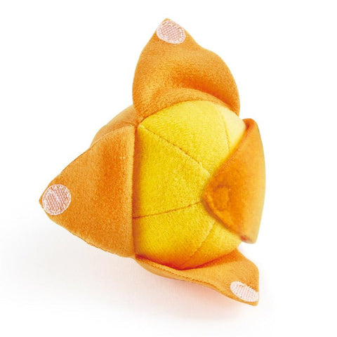 The HAPE Toddler Fruit Basket by HAPE includes a small, plush baby fruit toy shaped like a yellow ball with an orange, pointed hat. The hat features three triangular points, each decorated with a pink circular patch. This toy has a textured, soft feel and vibrant colors, making it ideal for adding to your soft felt basket collection.