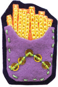 The Klutz Make Your Own Stick on Patches by KLUTZ features a vibrant fabric patch showcasing a container of French fries. The fries are crafted from yellow yarn, and the container is made from purple felt with green stitching, embellished with yellow sequins. Ideal for adding to your sewing kit or sticking onto your favorite items, this vivid patch stands out beautifully against a dark felt background.