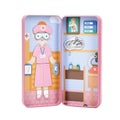 The MIEREDU Travel Magnetic Puzzle Box - Dream Big Series Health Professional by MIEREDU is a pink toy medical kit set featuring a health professional figure with a clipboard and pill bottle, dressed in a pink uniform. The kit includes surgical instruments, medical files, and medicine bottles, all organized within a colorful, cartoon-style case reminiscent of a puzzle box.