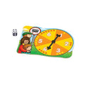 The Orchard Toys Bus Stop Game by Orchard Toys is a colorful board game designed for early learning in addition and subtraction. It features a small spinner with numbers 1 to 6 in yellow and orange segments, a black arrow, and includes a six-sided die. The background displays cartoon children and a sign reading "Bus Stop.