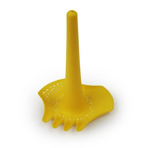 The QUUT Triplet Beach & Bath Toy - Yellow by QUUT is a versatile silicone kitchen utensil featuring a pointed, cylindrical handle and a fin-like perforated base, ideal for straining or separating food items. This multifunctional tool comes with multiple drainage holes and can also be used as a fun beach toy for kids to play with sand.