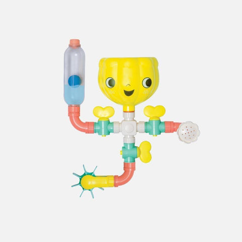 Introducing the Tiger Tribe Waterworks by TIGER TRIBE: a vibrant bath toy featuring a yellow, cup-like head adorned with a smiling face. This delightful toy has multiple arms crafted from assorted tubes and connectors, closely resembling a Waterworks Pipeline. It comes with playful attachments such as flowers and a spinning wheel in an array of cheerful colors like pink, blue, and green—perfect for nurturing STEAM skills in young minds.